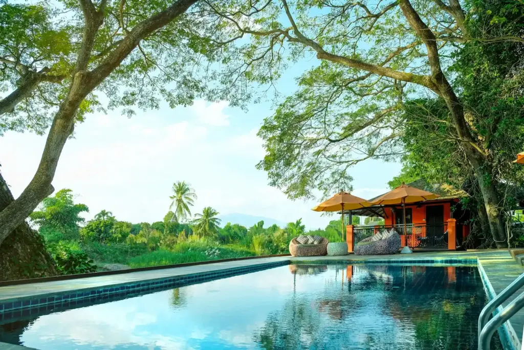 Riverside swimming pool and orange pavilion at Viva Rehab Thailand in Chiang Mai